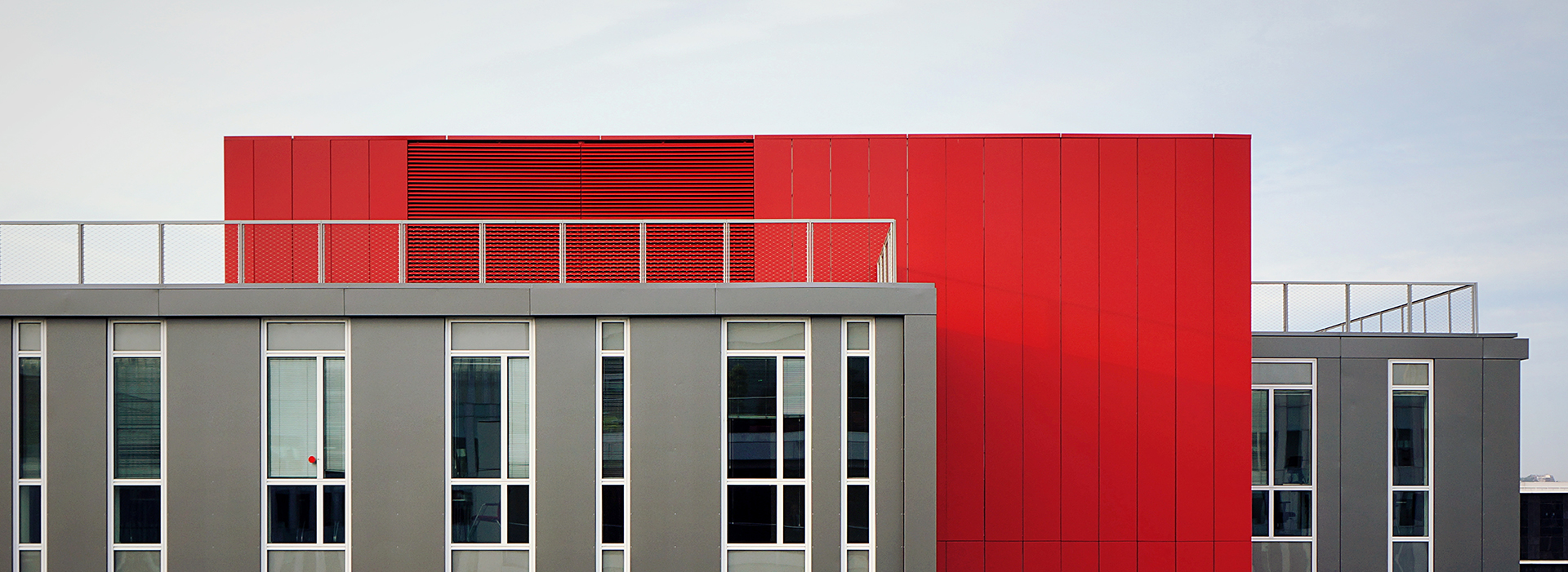 about_header.jpg Office building view from the outside