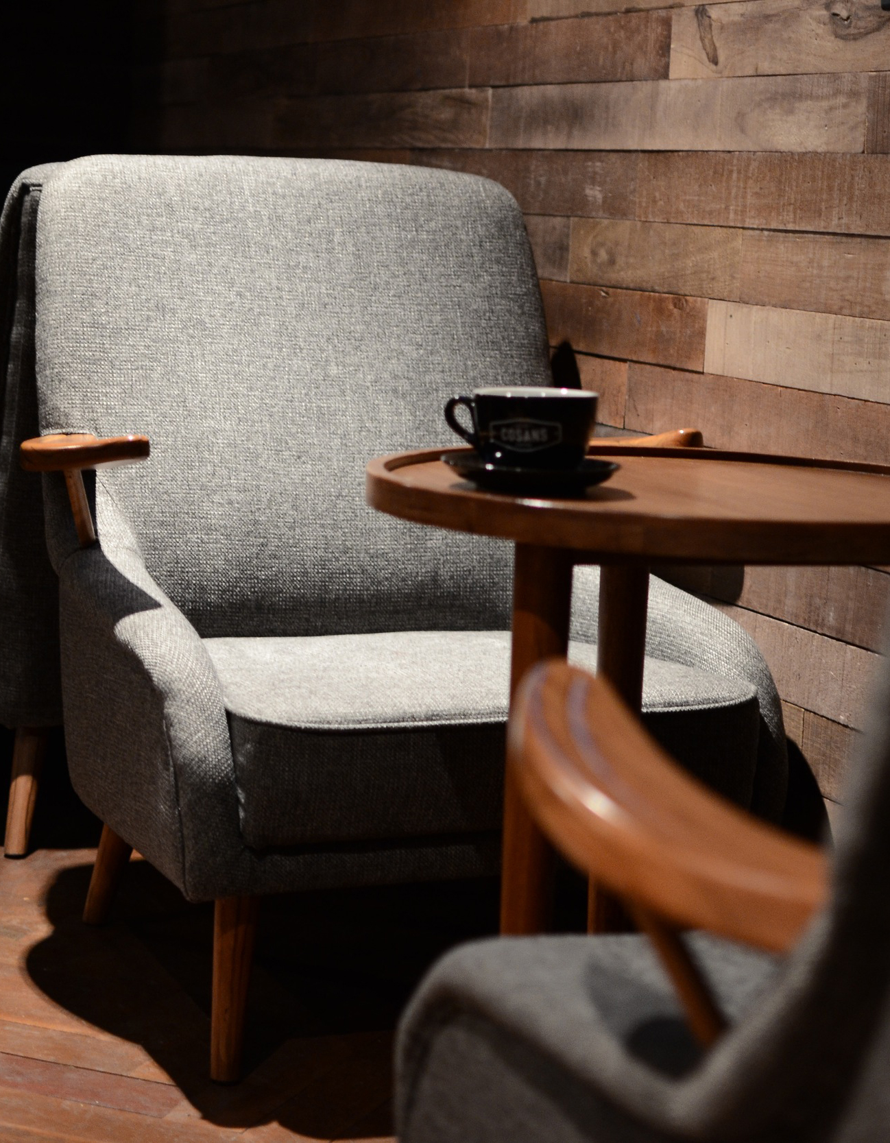 home-post-03.jpg A coup of coffee on a table with two chairs