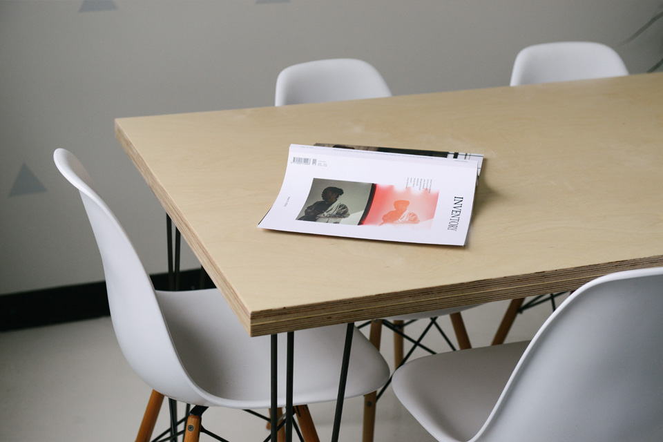 press-image-02.jpg Office table with magazine